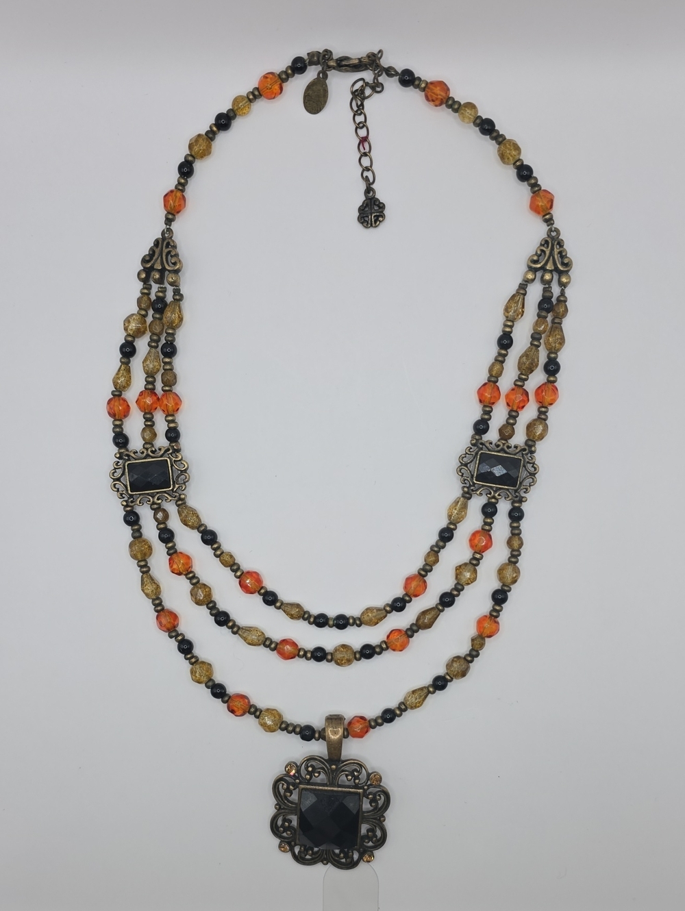 Layered Black, Orange and Gold Beaded Pendant Necklace